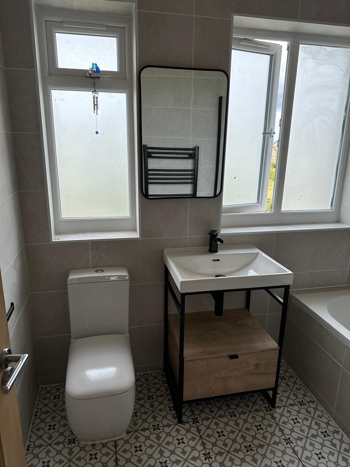 Wall-hung vanity unit and basin fitted on a Manchester bathroom installation