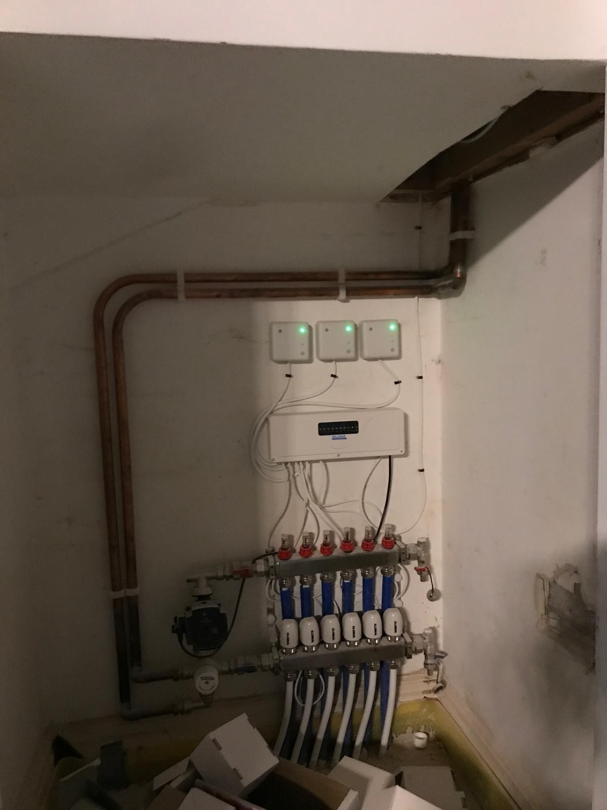 Underfloor heating manifold, wiring centre and copper pipework inspected during a leak detection visit in Manchester