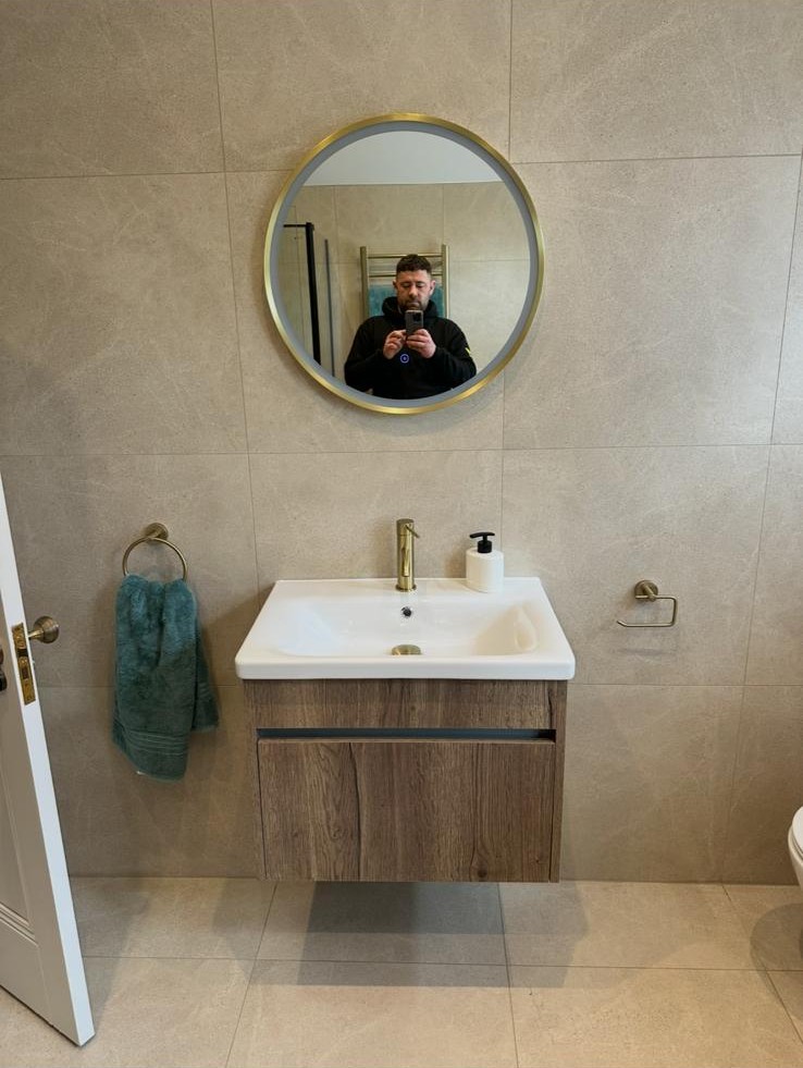 Vanity unit, basin and mirror fitted on a completed Manchester bathroom installation